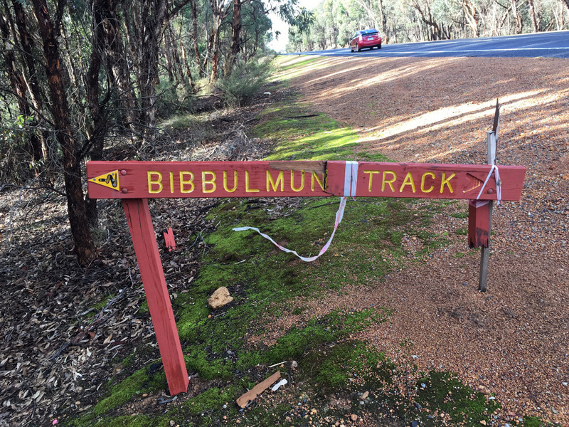 Somewhat Trashed Bibb Track Sign