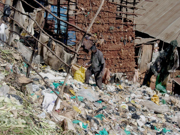 Walking through the garbage in Kibera