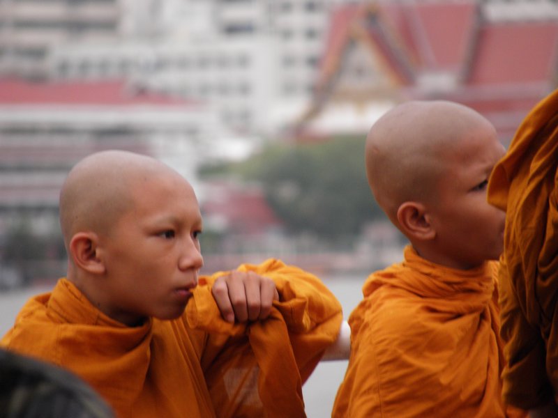 young monks on the river boat