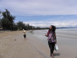 walking at Tanjung Aru Beach