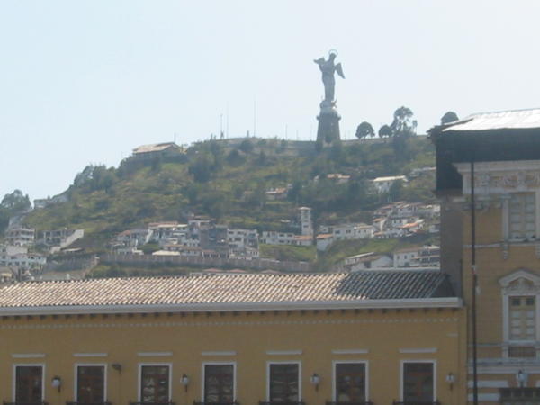 the winged virgin watching over Quito