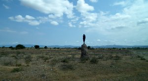 Masai boy on the termite hill