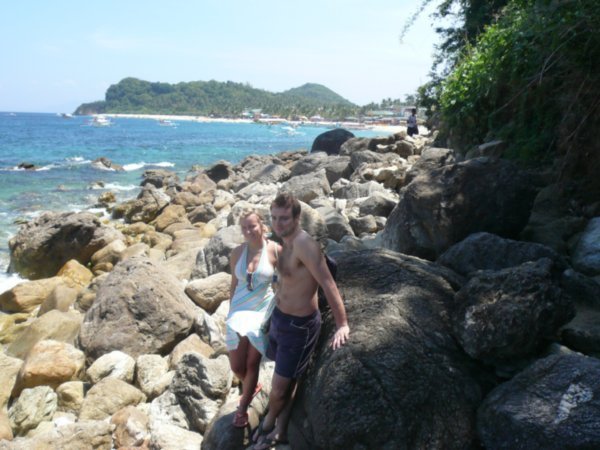 Gary and Milena on the headland rocks going to Anilao Beach, White Beach's quieter neighbor.