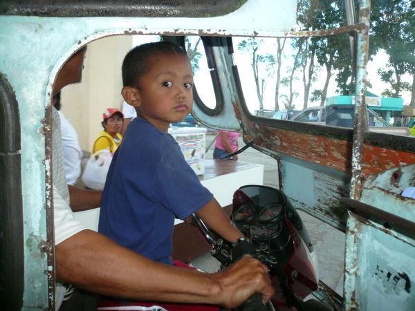 Not entirely sure that our tricycle driver up to the Chocolate Hills had his license!