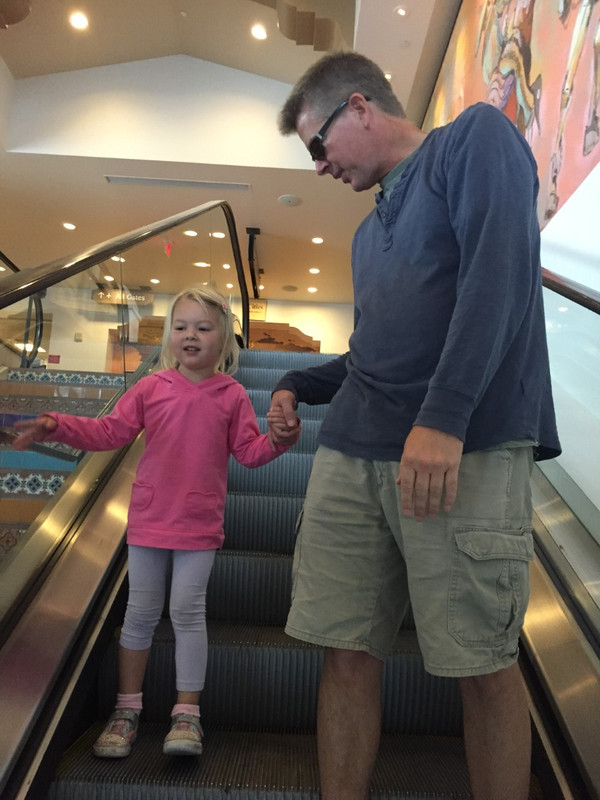 We spent more time riding the escalators than watching planes