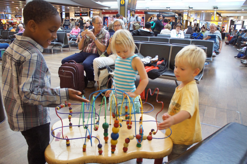 Making friends in Heathrow with a Nigerian boy.