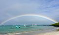 Rainbow on pier beach