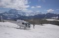 landing beside another copter on the snow