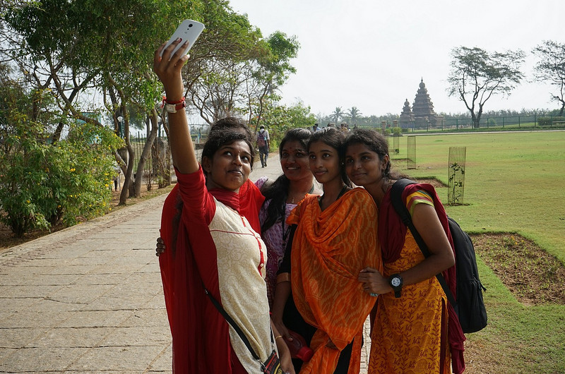 A selfie near the shore temple