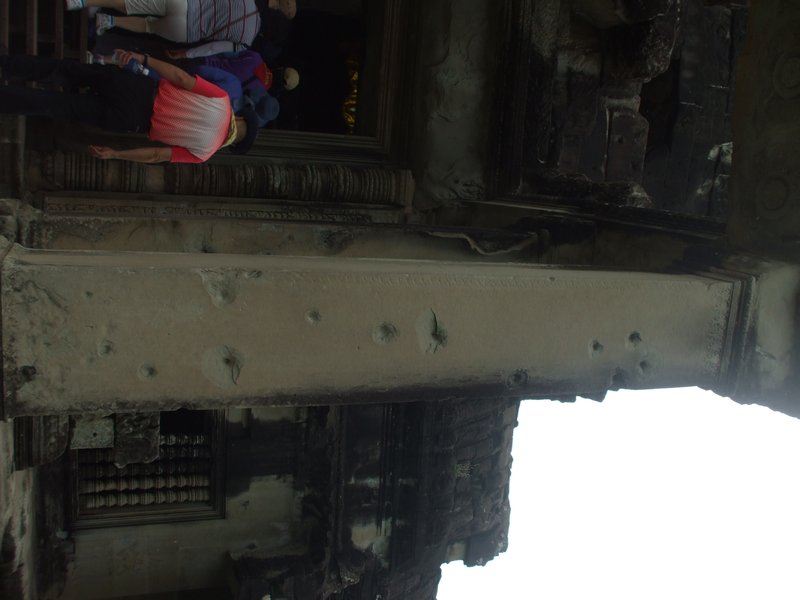 Bullet holes in pillar - Angkor Wat