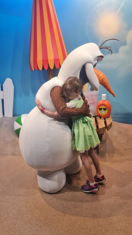 Giving Olaf warm hugs