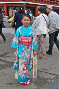 Young Girl in Kimono at Temple
