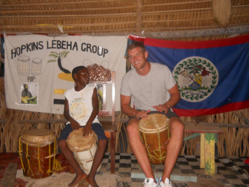A 6yr old boy teaching Steve the beats to Garifuna style drumming!
