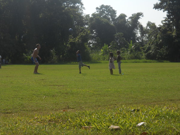 Steve playing football with the local kids in Omoa