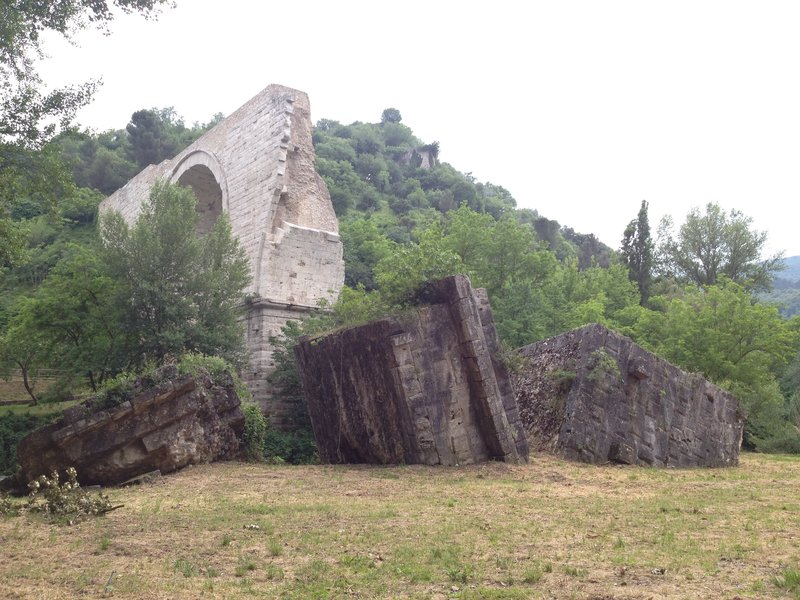 Compare the state of the fallen ruins with the cleaned standing ruins
