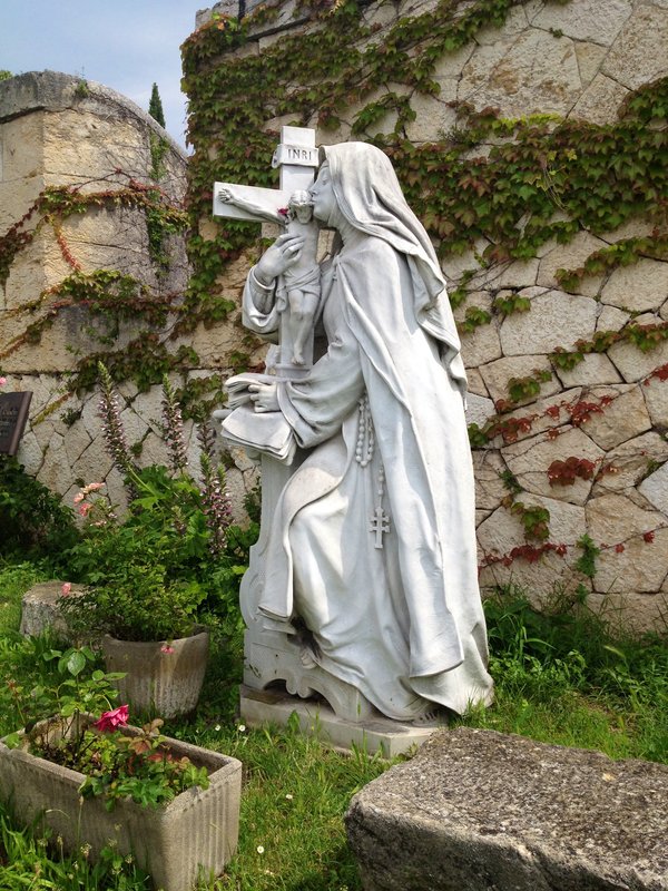 Statue in the garden of Santuario della Madonna di Lourdes