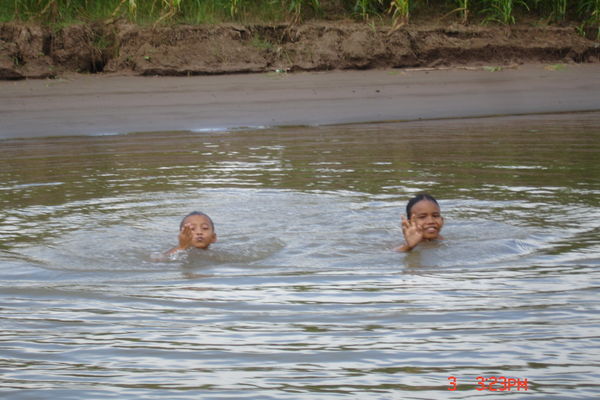 Kids Playing On The Mekong
