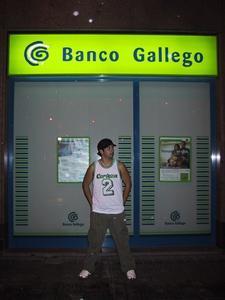Posing in front of the gallego bank