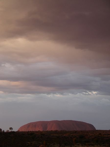 Sunrise rain on Uluru