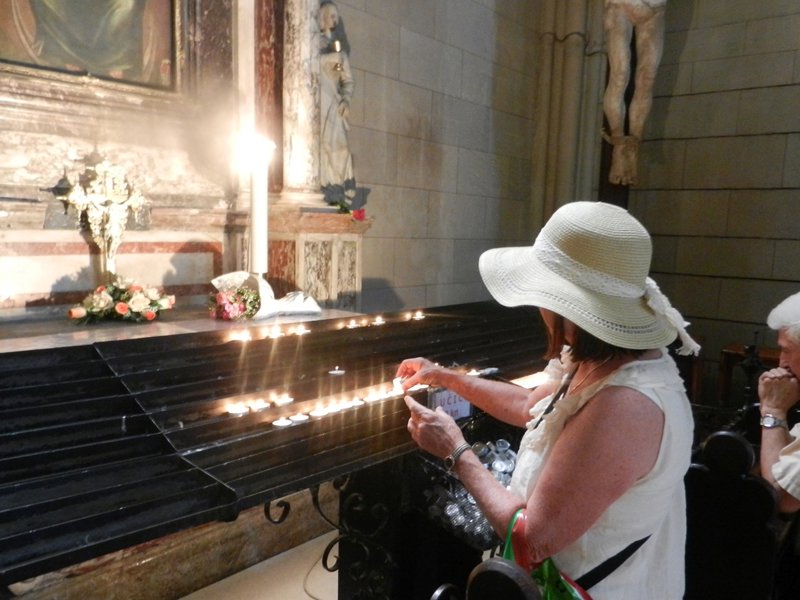 Lighting Candles at the Cathedral