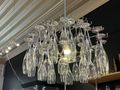 Practical type of chandelier. If you need a glass just take it from the light fitting. 
