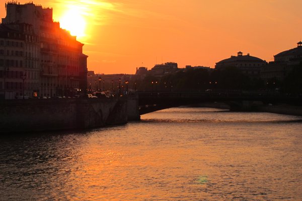 sun sets over the Seine