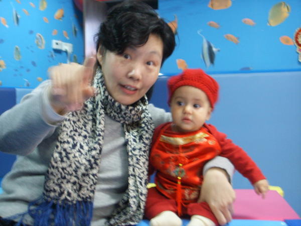 Baby with Chinese helper