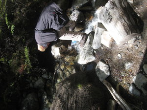 Michael collecting stream water