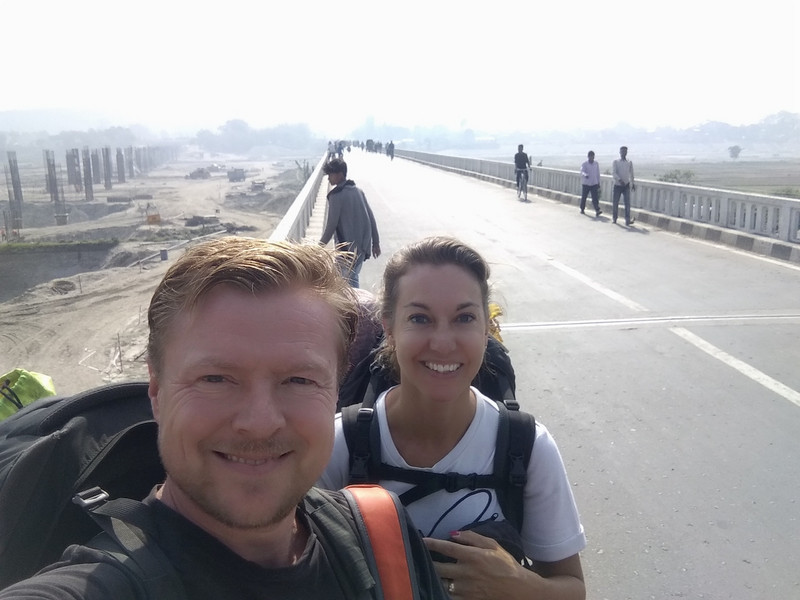 Walking across the border bridge from Nepal to India