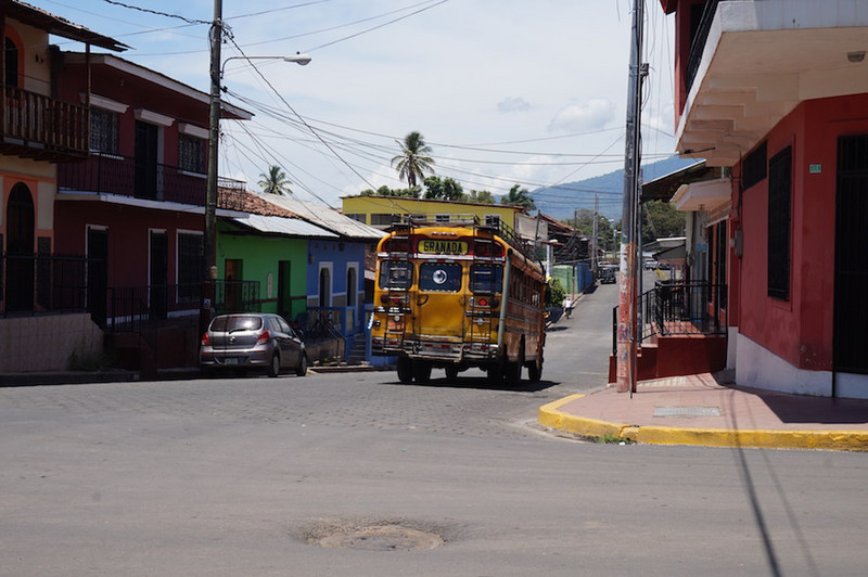 Local street and old imported schoolbus