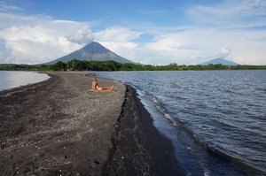 View from the black sand beach of both volcanoes
