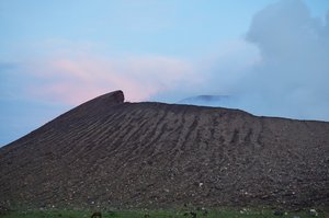 The huge crater in the morning, clouds of sulfur