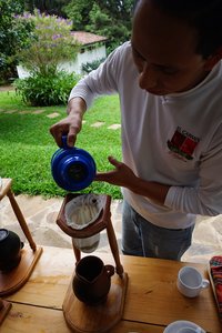 Preparing our tasting coffee in a Chorreador, a manual drip coffee maker
