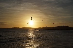 Kitesurfing during sunset