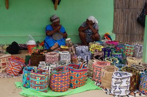 Local Wayuu tribe women crocheting Guajira mochilas