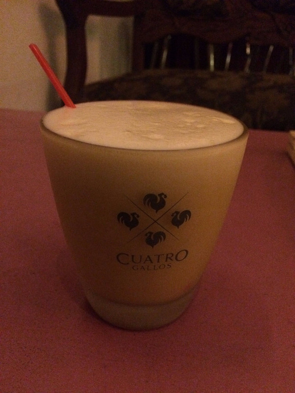 Maracuya sour - a pisco sour made with passion fruit