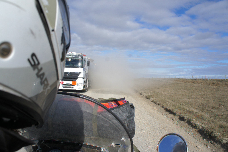 Facing lorry dust on ripio road