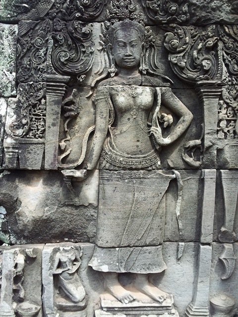 stone carving of woman bayon temple