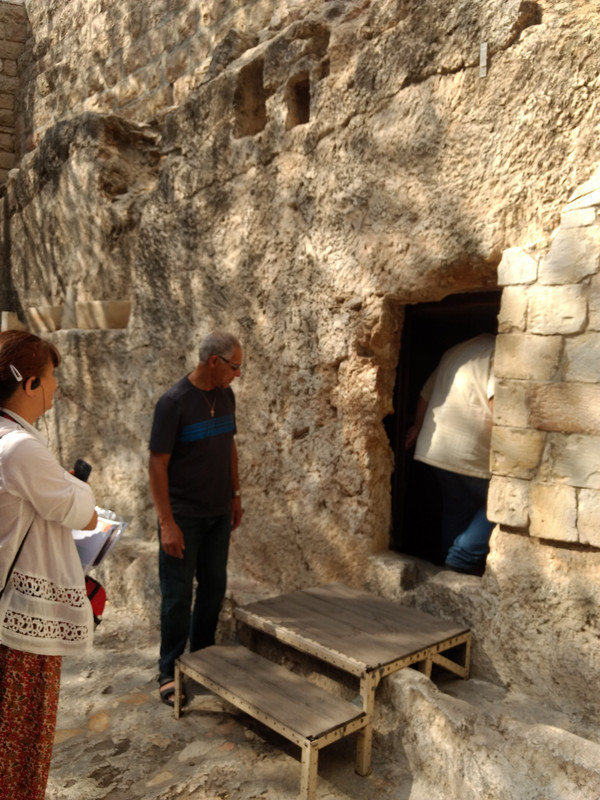 At the entrance to the tomb.