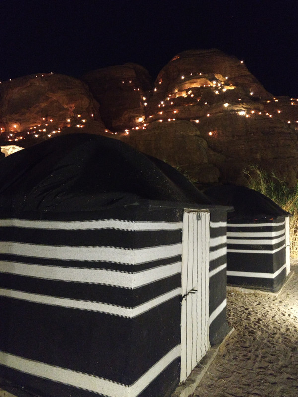 Lights adorn the hills on site, above our tents.