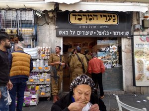 Soldiers patronize a popular shop in west Jerusalem.