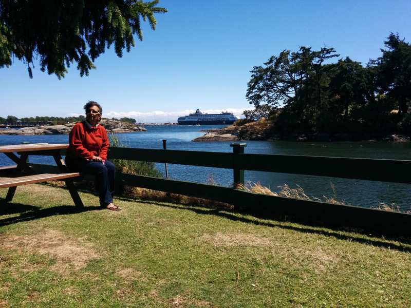 Gee at first motor home site on island, Oak Bay, Victoria. Cruise ship entering Victoria harbour in background.