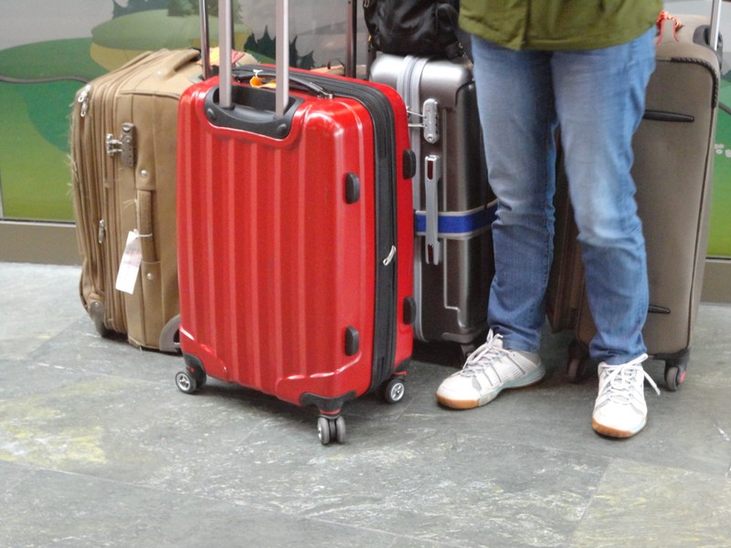 Two persons, four full suitcases.