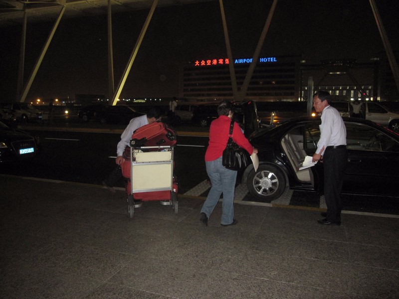 Getting into the limo on arrival at Shanghai Airport