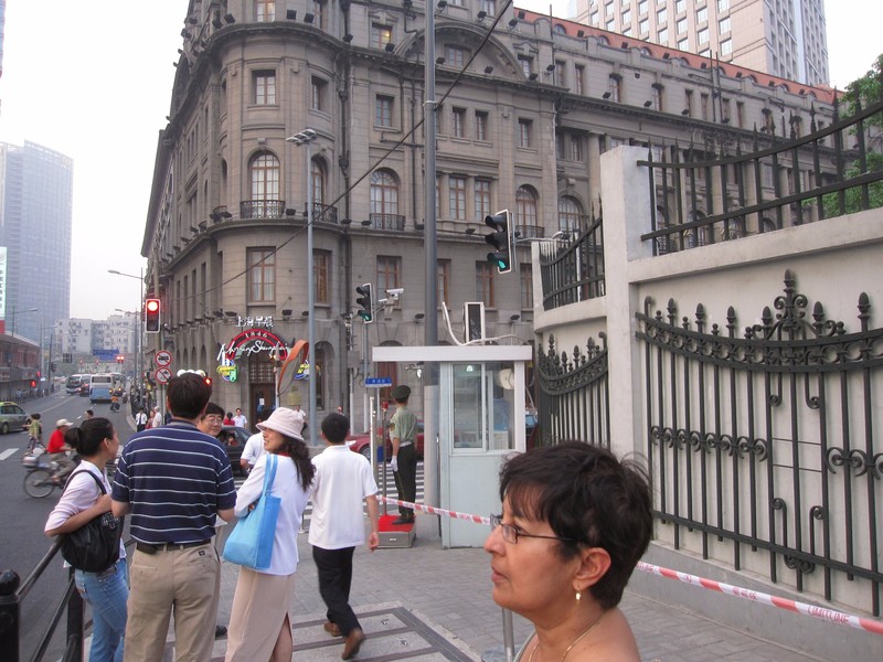 In the Bund with Astor House in the background.