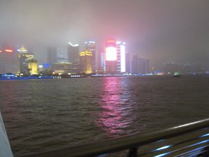 Across the river looking at Pudong at night.