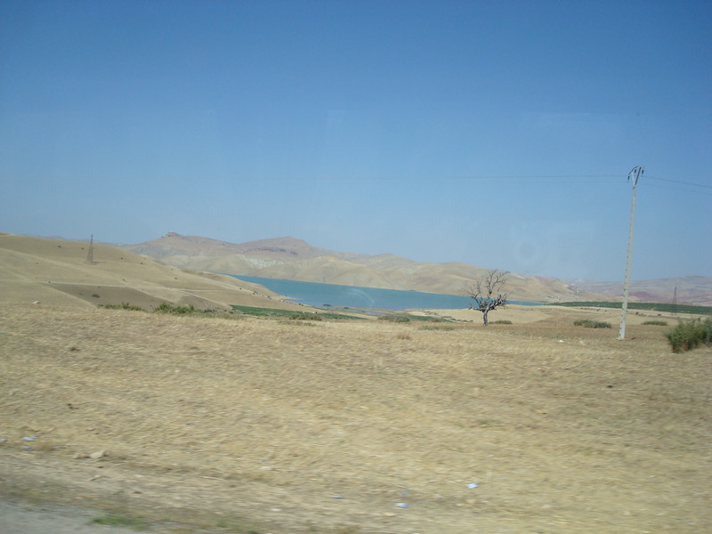 Water breaks the monotonous arid landscape as we drive between cities.