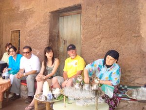 The matriarch of the Berber family serves us mint tea.