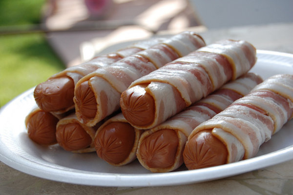 Hot dogs.  Wrapped in Bacon.