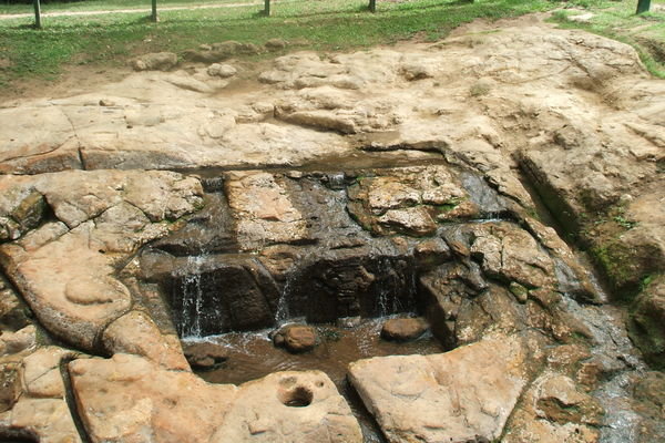 Water feature with carved channels